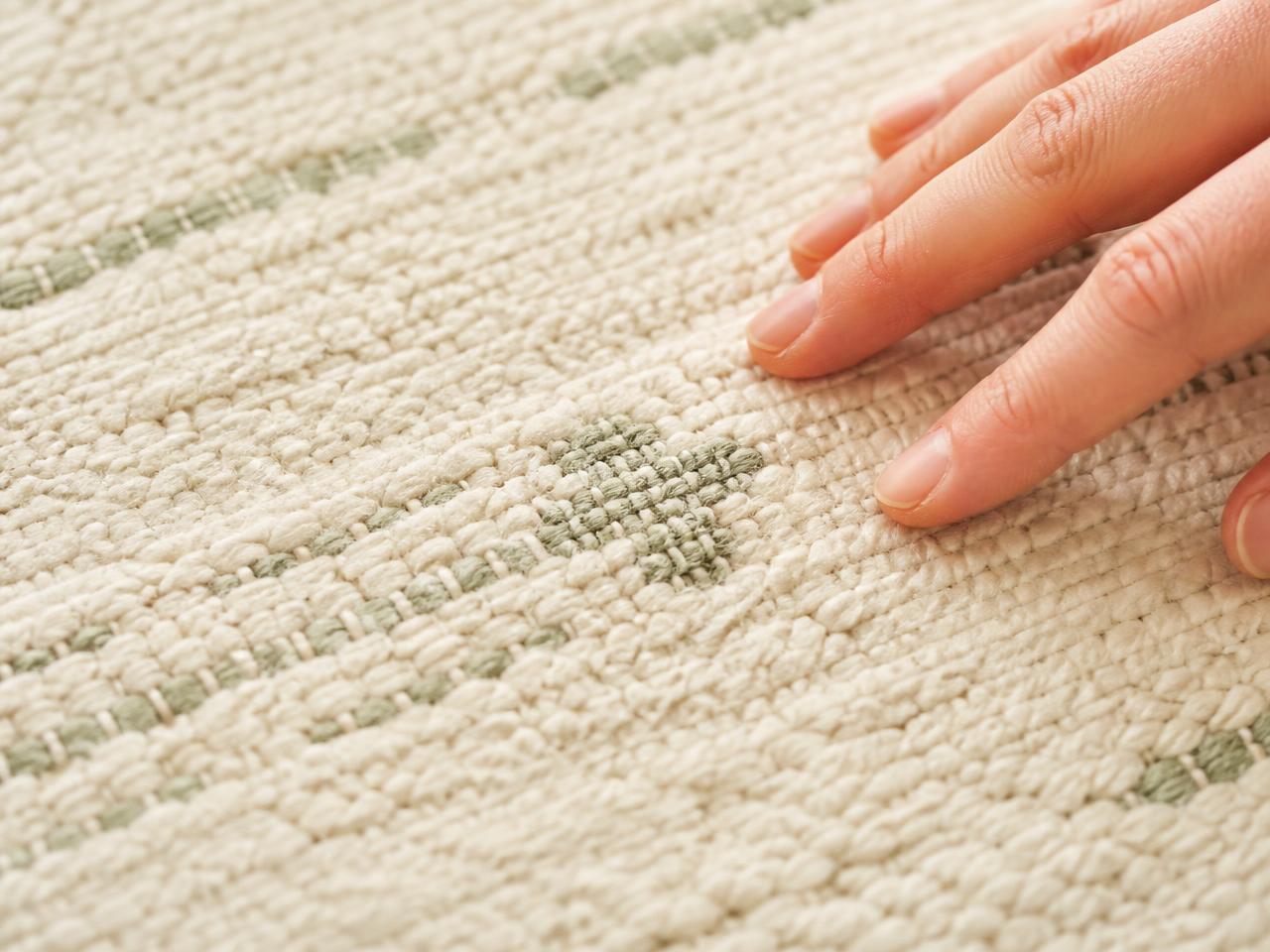Macro close-up of the woven organic cotton pile of a Gatsby Baby rug
